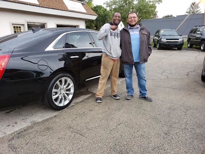 Alex from Angler Motors with a happy customer